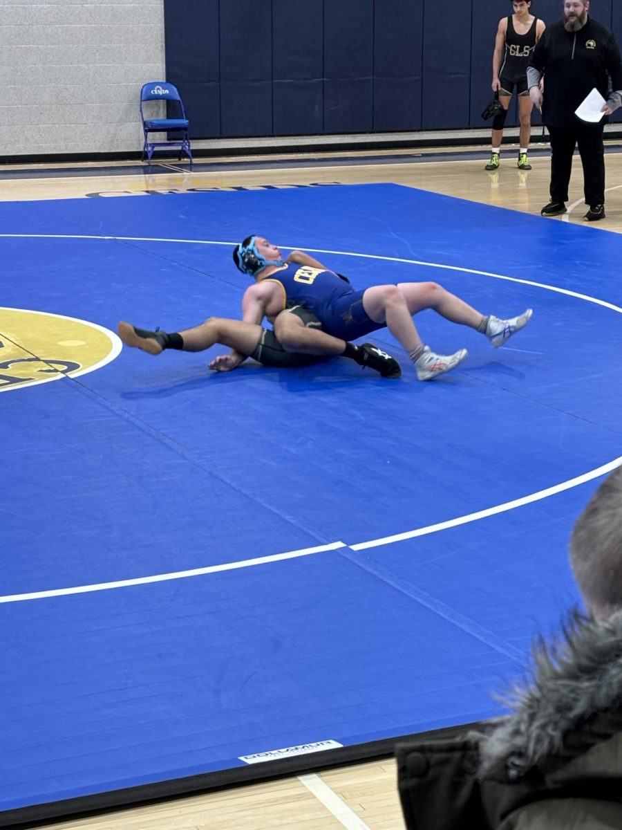 Lions compete against Cougars in wrestling match on Jan. 14