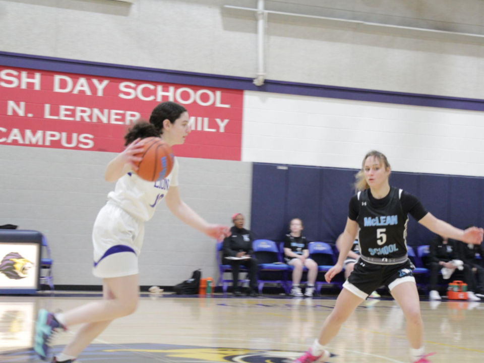 Freshman Selma Teichman dribbles the ball up the court looking to score.