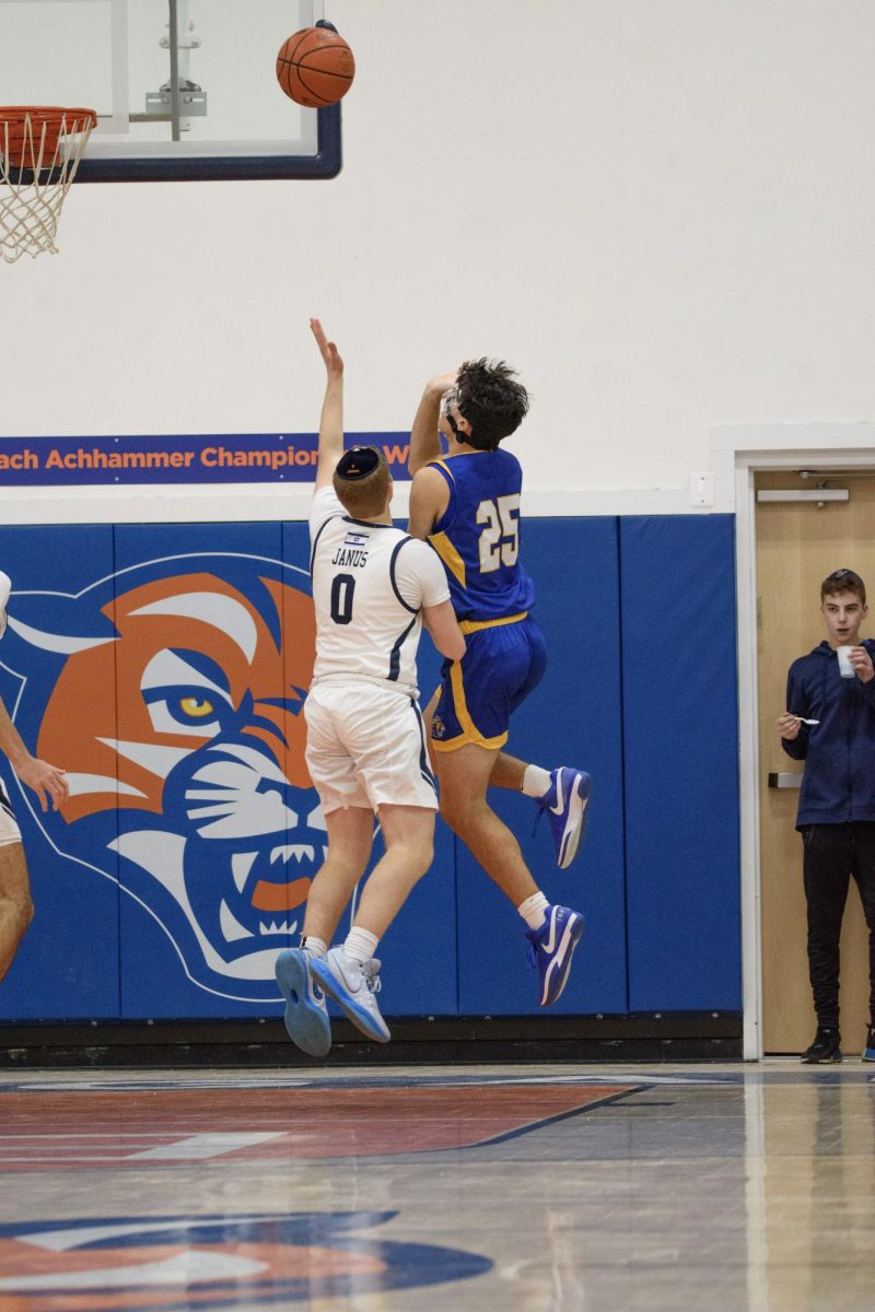 After a 73-42 loss in their first game of the season against the Cougars, the Lion's second season game against Berman was closer, with a score of 56-43.