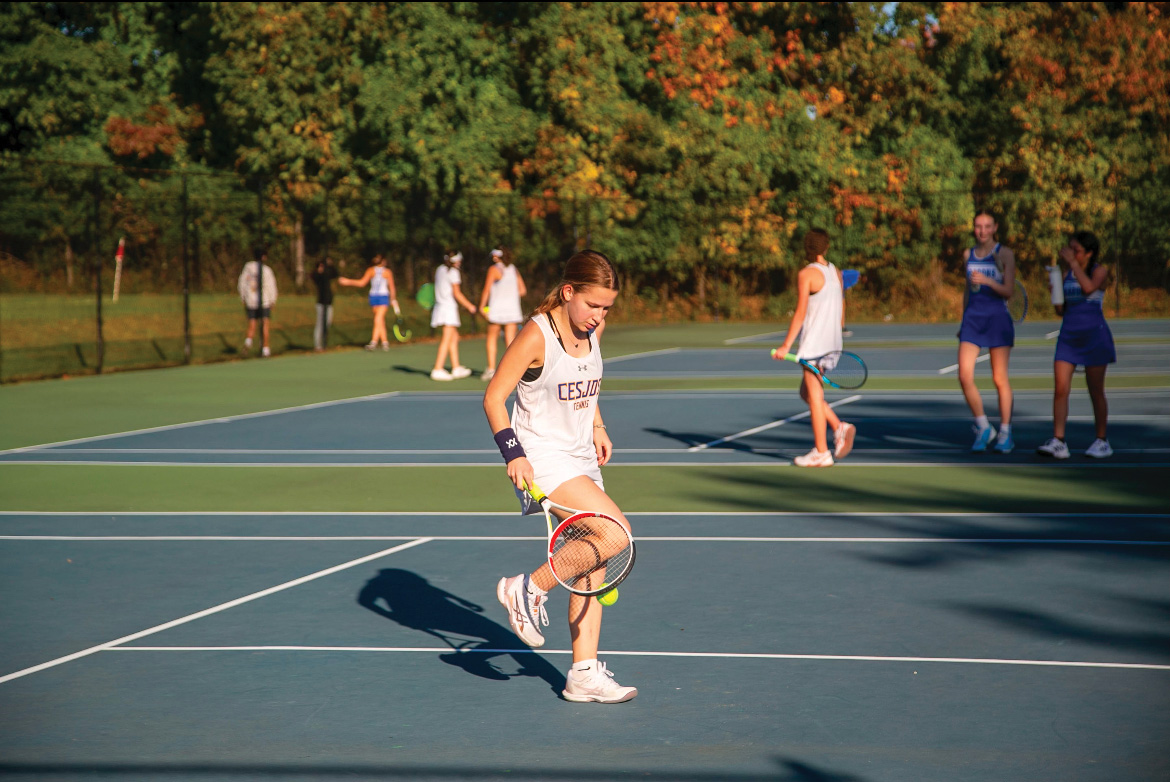 Girls varsity tennis earns a championship win for the fourth time in a row.