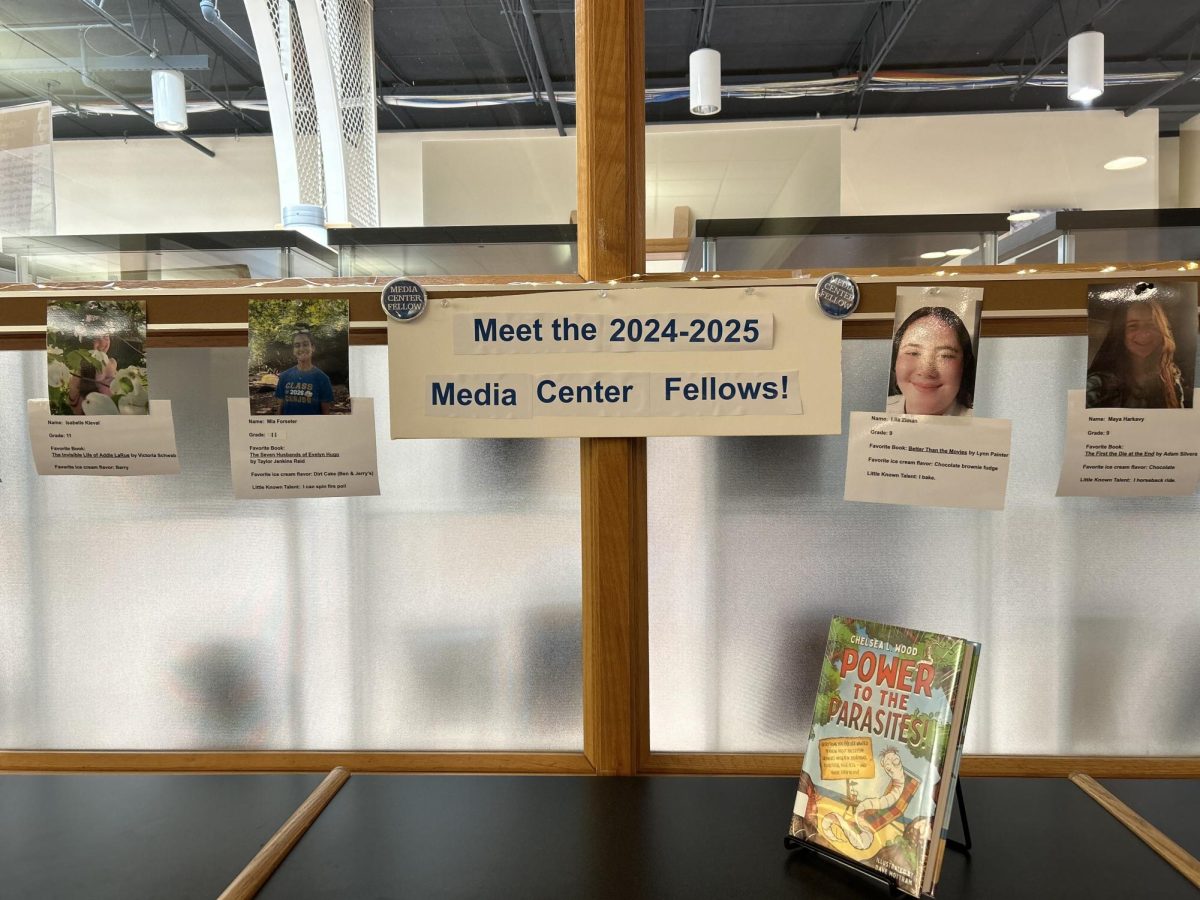 Pictures of every Media Center fellow are hung in the library with a brief description of them, including their favorite books. 