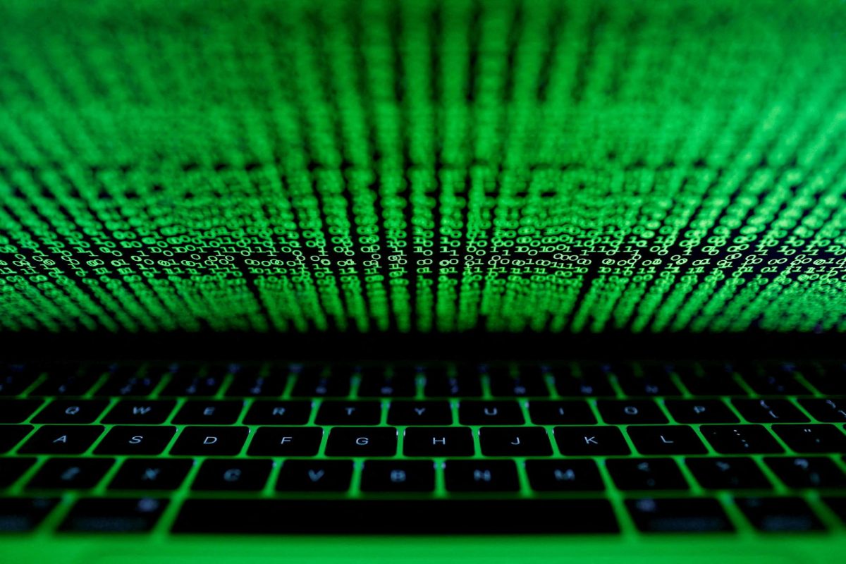 A computer keyboard lit by a displayed cyber code is seen in this illustration picture taken on March 1,  2017. REUTERS/Kacper Pempel/Illustration