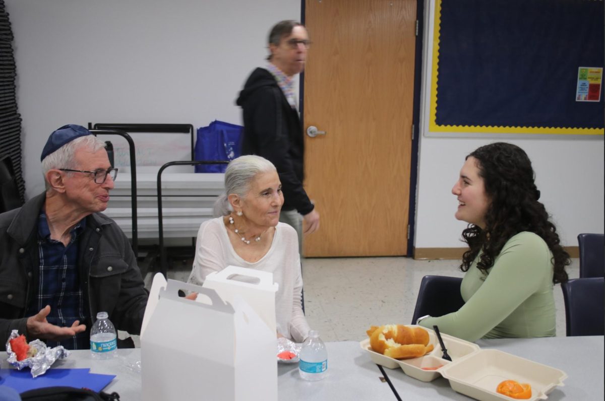 Junior Ella Longman eats lunch with her grandparents. 