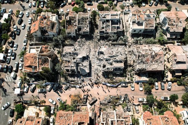 A drone photo shows the damage over residential homes and at the impact site following missile attack from Iran on Israel, in Rishon LeZion, Israel, June 14, 2025. REUTERS/Ammar Awad