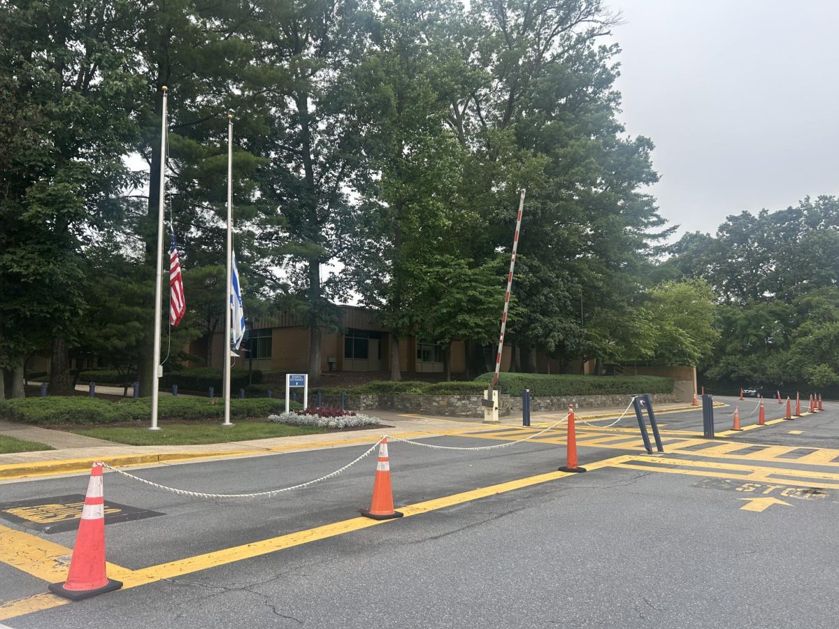 The arrested man was first identified as suspicious after not following carpool protocol at the end of the day on June 12 at the Lower School campus. 