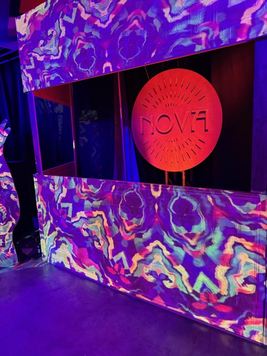 The stage display at the Nova Music Festival Exhibition features background music and intricate lighting blended with survivor testimonies and haunting footage from Oct. 7, creating a fully immersive experience as visitors walk through the exhibition.