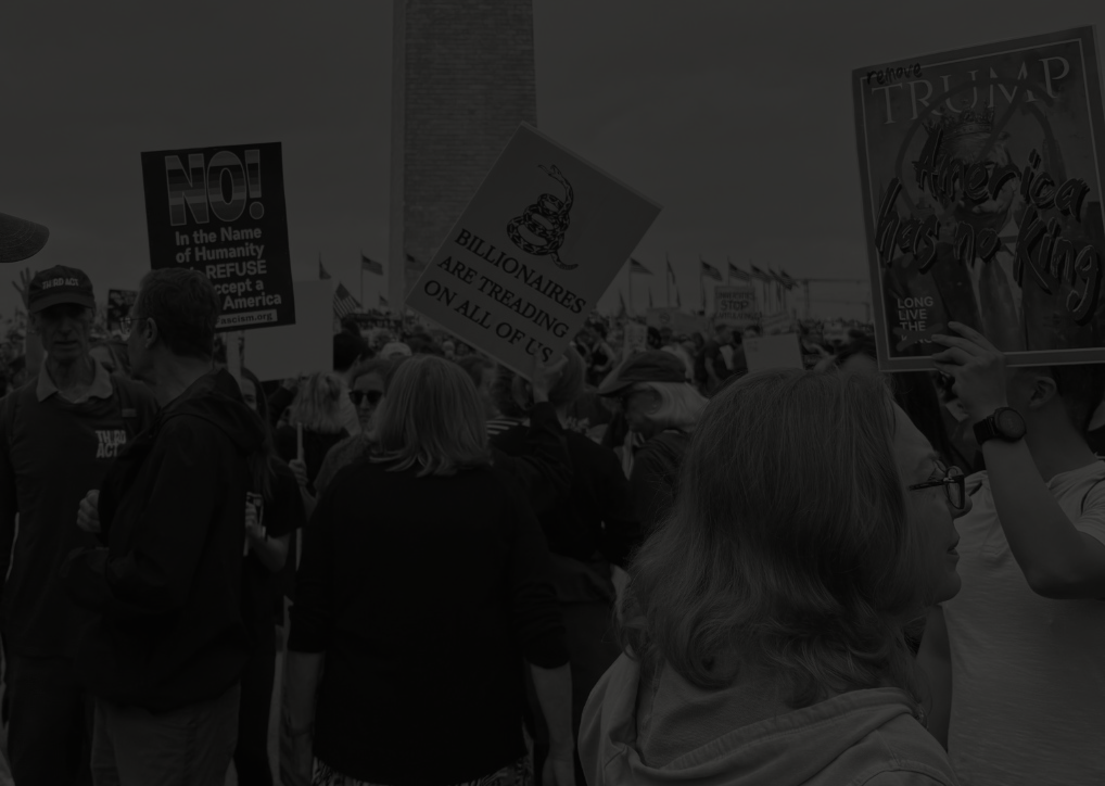 People engage in "No Kings" protests outside of the Washington Monument against executive overreach in the second Trump administration. 