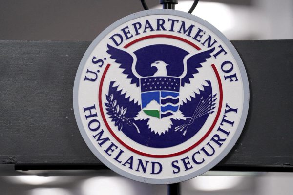 The U.S. Department of Homeland Security seal is displayed at the FEMA National Response Coordination Center in Washington, D.C., U.S., January 24, 2026. REUTERS/Nathan Howard