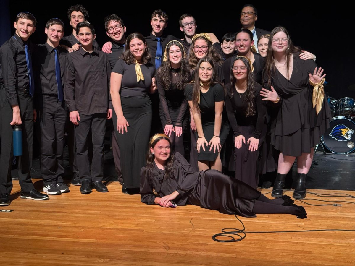 The school's a cappella troupe, Shir Madness, after their Winter Concert performance.