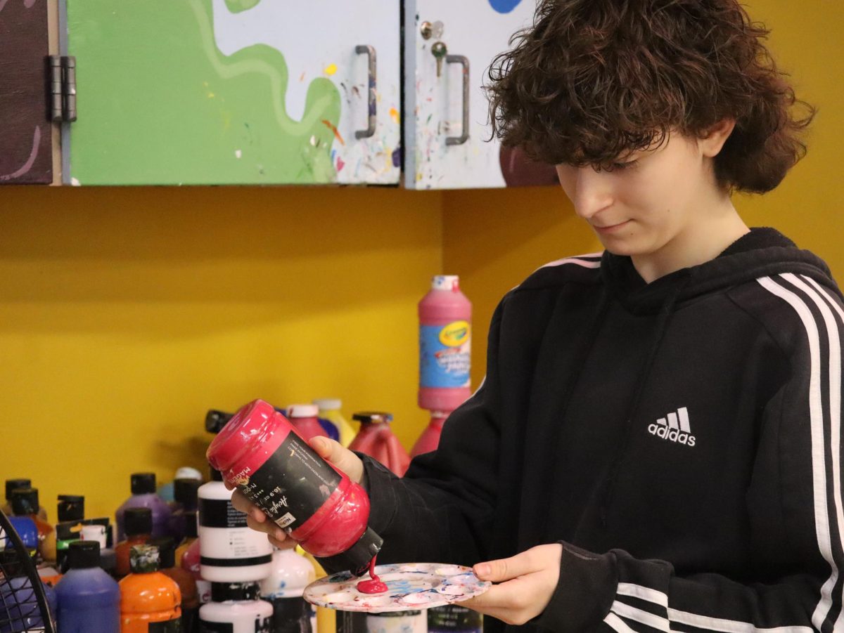 Sophomore Kody Silver works in the art room during lunch 