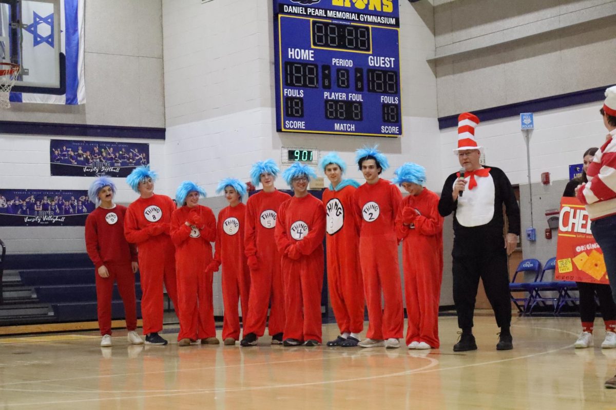 Ray Hodges' physics two class has a yearly tradition of dressing up together for Purim. This year, they dressed as the Cat and the Hat and the Things. 