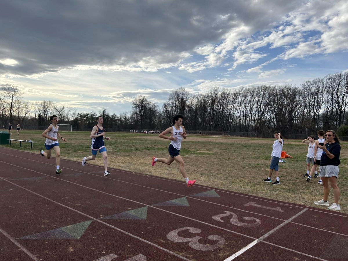 Freshman Jake Forseter and junior Isaiah Segal-Geetter speed through the finish line. 