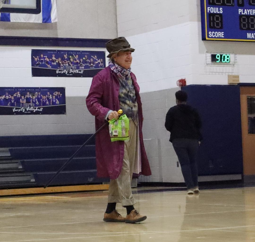 High School Jewish Text Teacher Paul Blank participates in the costume contest dressed as Willy Wonka.