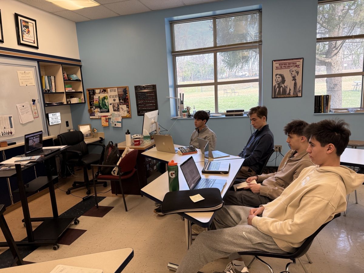 Members of the Lion's Tale attend video conference.