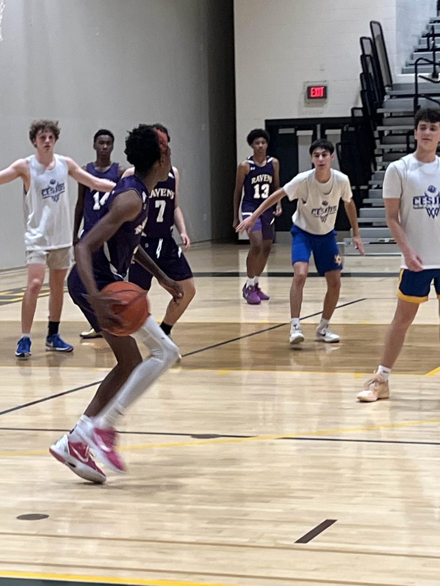 Players from the boys spring basketball team participate in a tournament last spring.