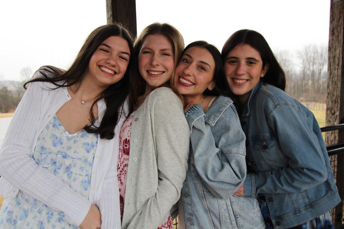 Juniors Lilah Sacks, Molly Rose Cloutier, Raizy Moshinksy and Yarden Wilkenfeld take pre-Shabbat pictures.