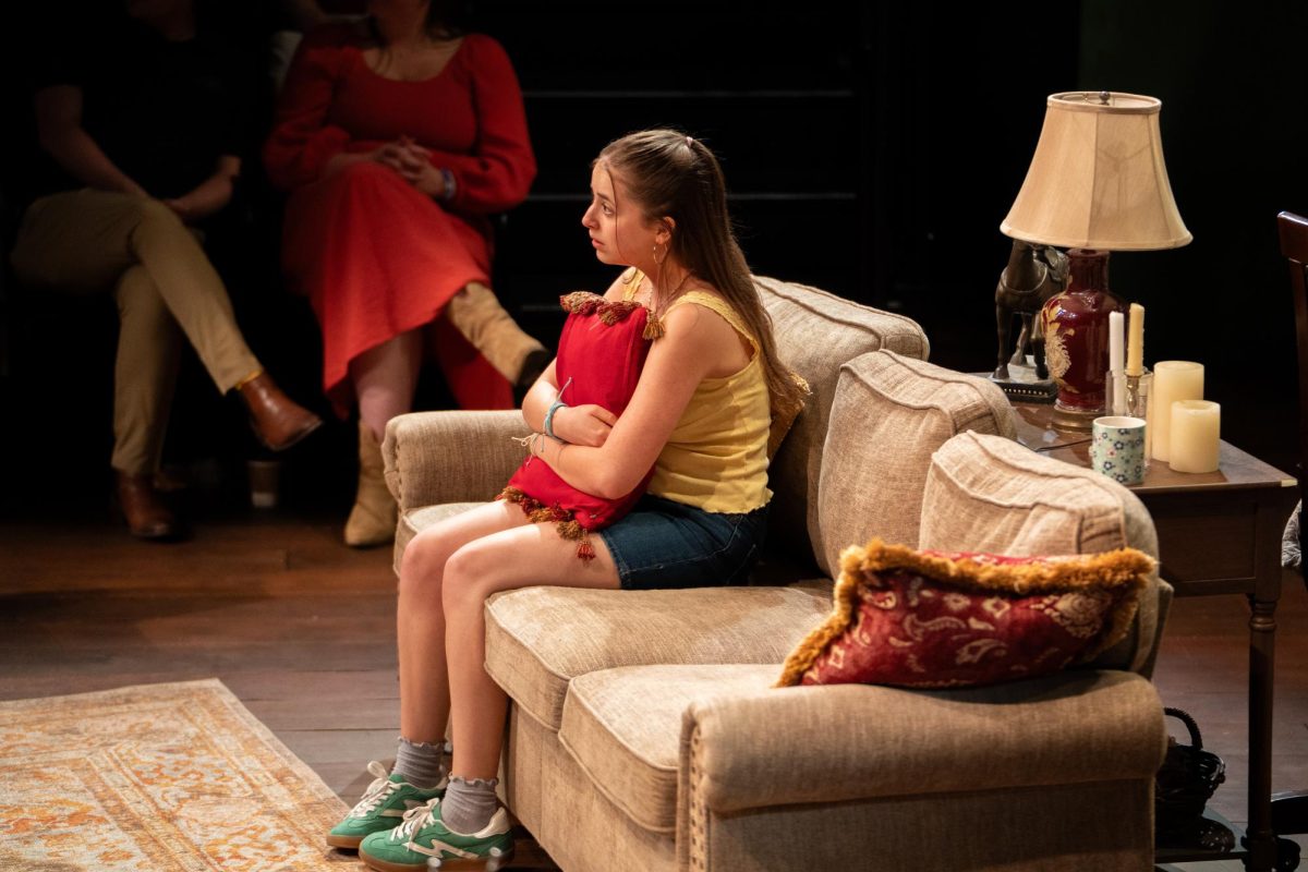 Ruby sits on stage in full costume in front of a live audience in Olney Theater’s production of “Appropriate.” Photo by Sarah Straub, used with permission