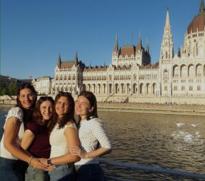 Seniors Amalia Netter, Tali Loeffler, Ella Longman and Maya Greenblum in front of the Hungarian Parliament. Photo from Maya Greenblum, used with permission.